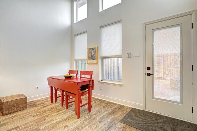 2210 Onion Creek Pkwy Unit 603, Austin, TX 78747 - dining space featuring light wood finished floors and baseboards