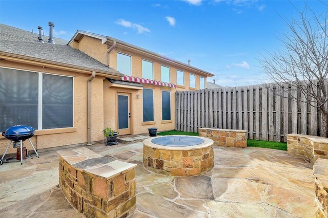 2210 Onion Creek Pkwy Unit 603, Austin, TX 78747 - view of patio / terrace with a grill and a fire pit
