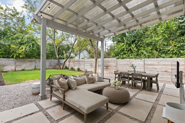 view of patio featuring outdoor lounge area and a pergola