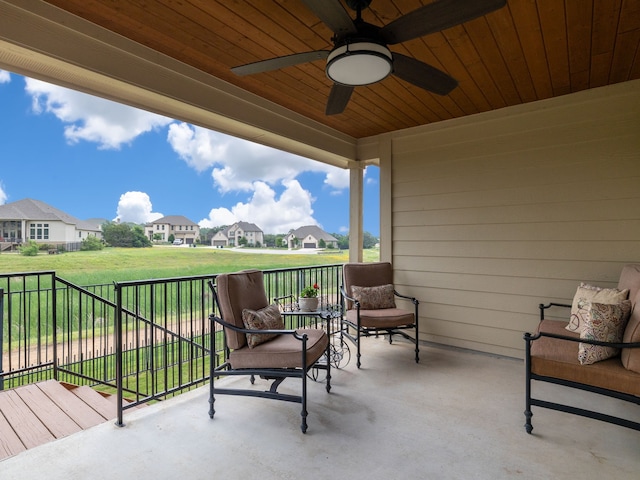 view of patio featuring covered porch and ceiling fan