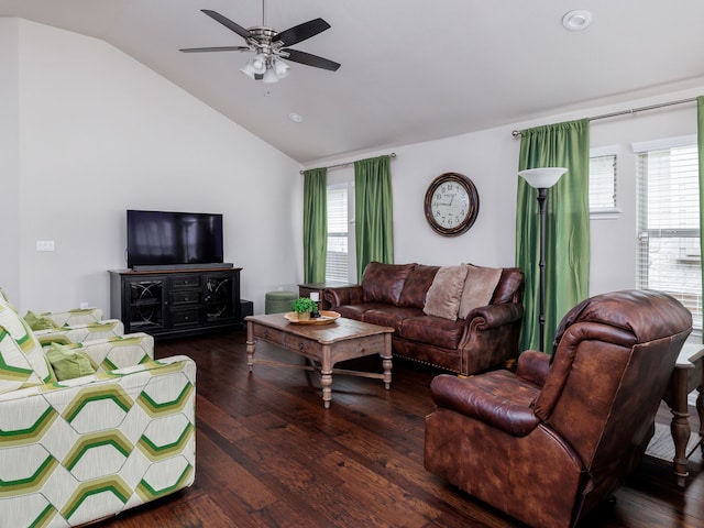 living room with dark wood-type flooring, ceiling fan, and vaulted ceiling