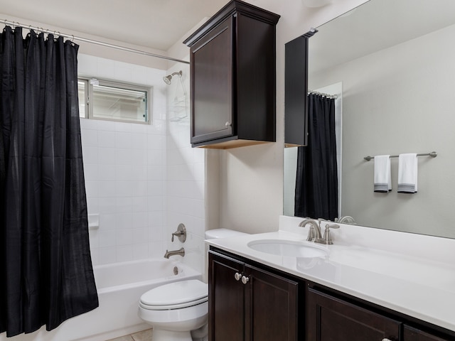 full bathroom featuring shower / bath combination with curtain, vanity, and toilet