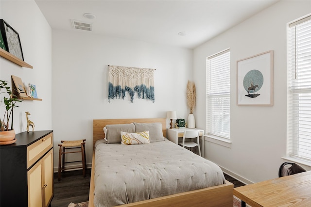 bedroom featuring dark hardwood / wood-style floors