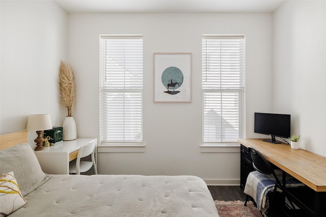 bedroom featuring dark hardwood / wood-style floors