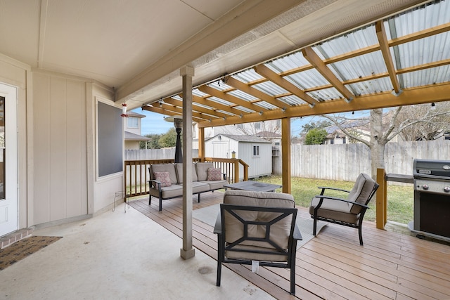 deck featuring a grill, a pergola, a storage unit, and an outdoor living space