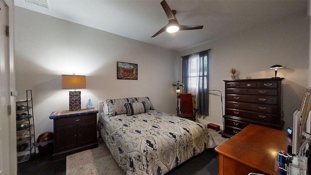 bedroom featuring ceiling fan and light colored carpet