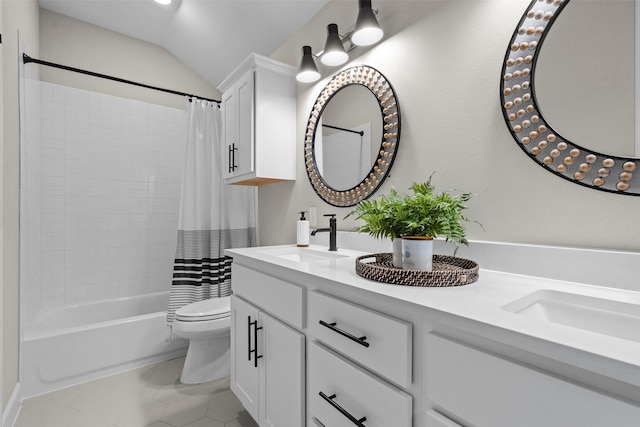 full bathroom featuring toilet, vaulted ceiling, shower / bath combination with curtain, and vanity