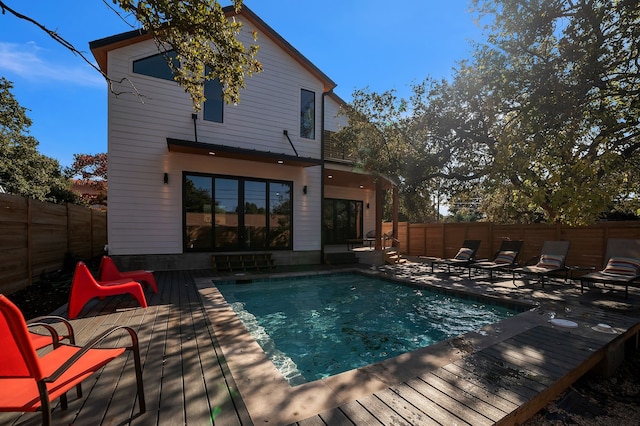 view of pool with a deck