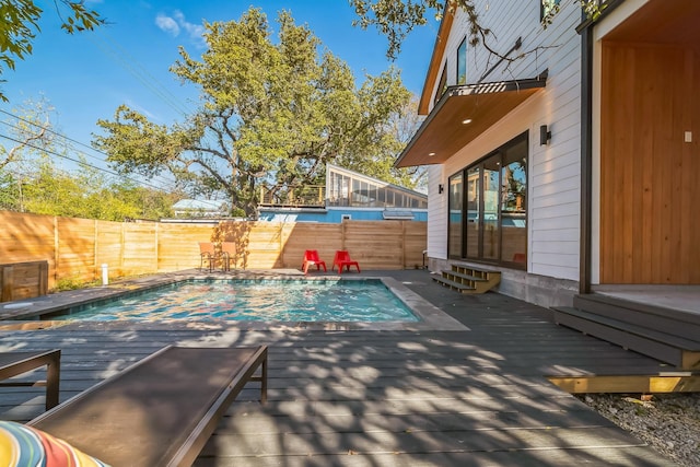 view of pool featuring a deck