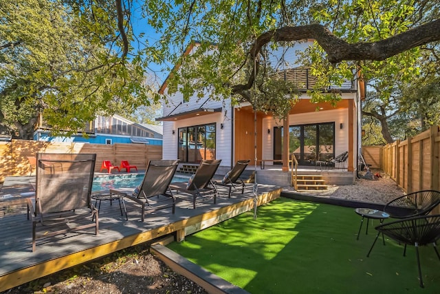 view of patio / terrace with a swimming pool side deck