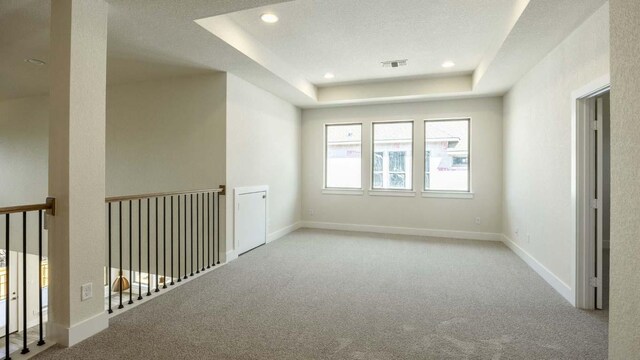 1728 Snowdrop Dr, Georgetown, TX 78628 - carpeted spare room featuring recessed lighting and a tray ceiling