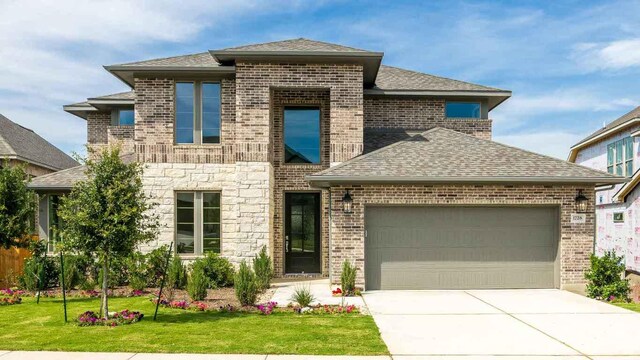 1728 Snowdrop Dr, Georgetown, TX 78628 - french country home featuring an attached garage, roof with shingles, a front yard, and concrete driveway