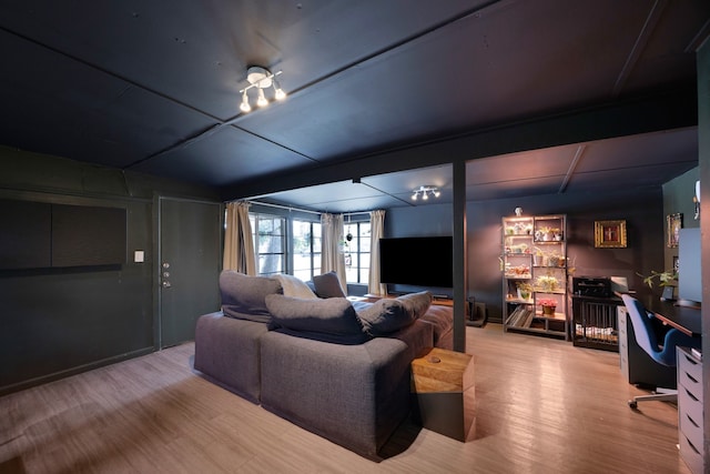 living room with light hardwood / wood-style flooring