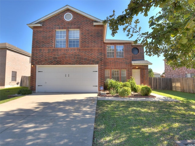 front of property featuring a front lawn and a garage