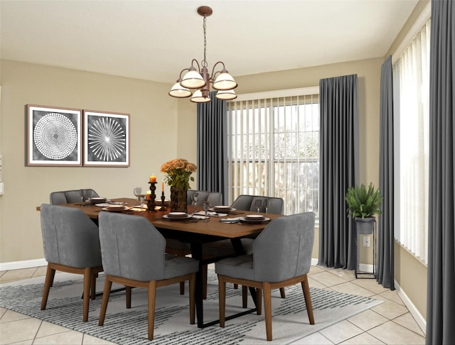 dining area with light tile patterned flooring and an inviting chandelier