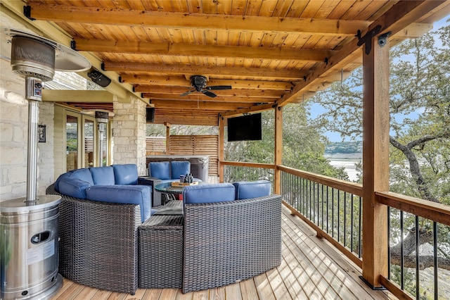 wooden deck with ceiling fan