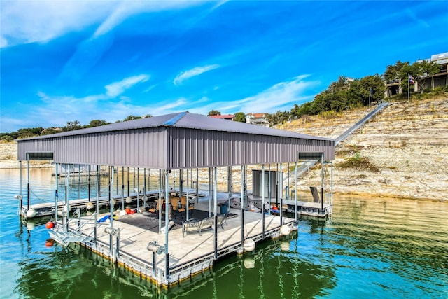 dock area featuring a water view