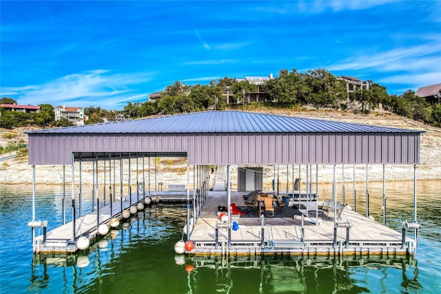 view of dock with a water view