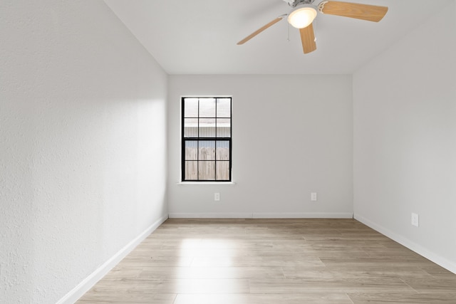 unfurnished room featuring ceiling fan and light hardwood / wood-style floors