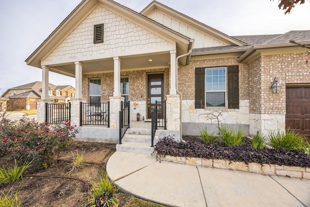 view of front of property featuring covered porch