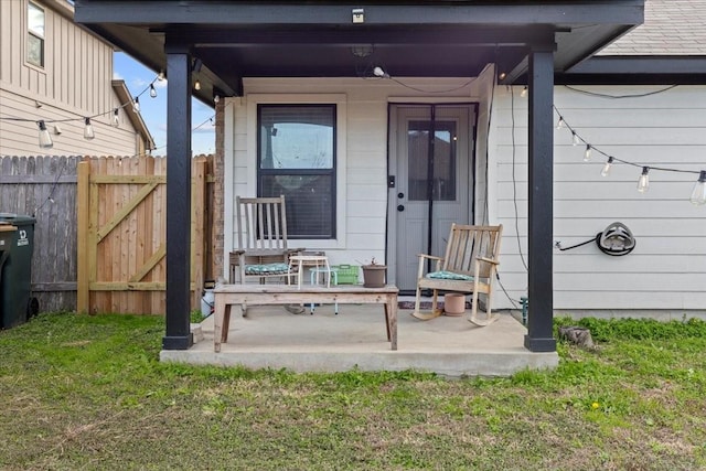 property entrance with a yard