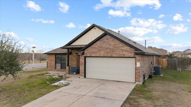 view of front facade featuring a front yard, a garage, and cooling unit