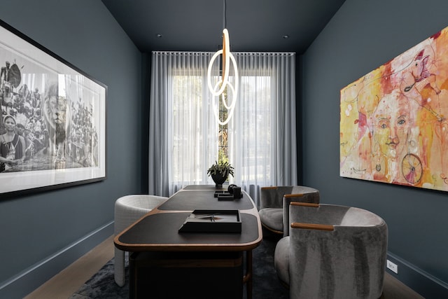 dining room with dark wood-type flooring