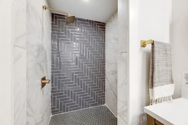 407 S Pine St, Georgetown, TX 78626 - bathroom featuring a tile shower, tile walls, and vanity