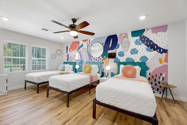 407 S Pine St, Georgetown, TX 78626 - bedroom with baseboards, light wood finished floors, recessed lighting, and a ceiling fan
