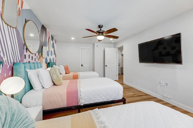 407 S Pine St, Georgetown, TX 78626 - bedroom with baseboards, wood finished floors, recessed lighting, and ceiling fan