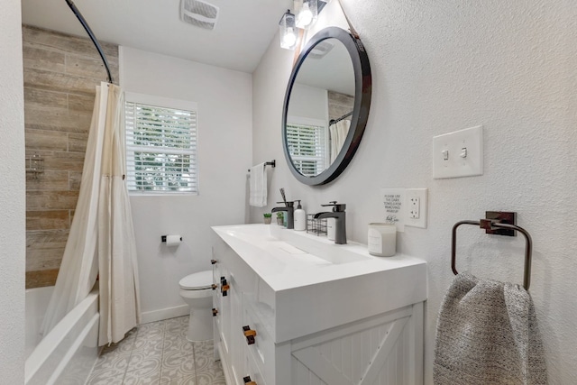 407 S Pine St, Georgetown, TX 78626 - bathroom with vanity, toilet, tile patterned floors, shower / bathtub combination with curtain, and baseboards