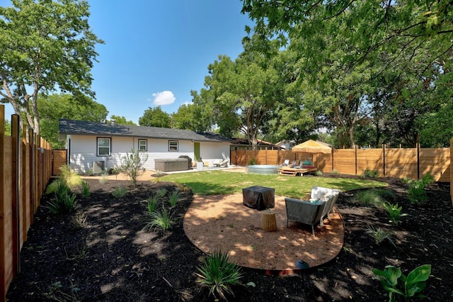 407 S Pine St, Georgetown, TX 78626 - fenced backyard featuring a hot tub and a patio