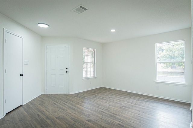 entryway with dark hardwood / wood-style floors