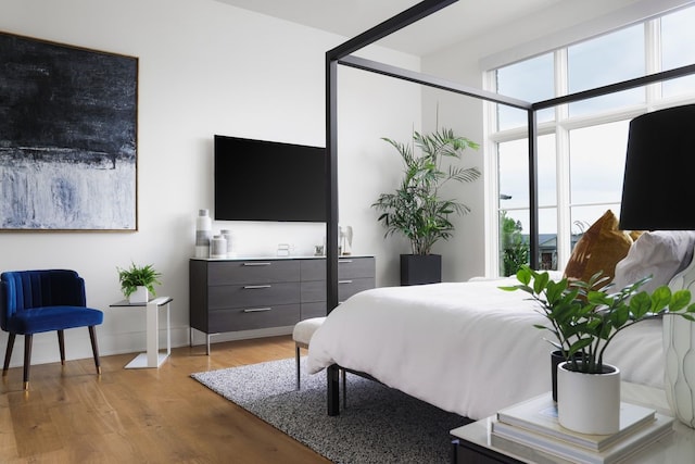 bedroom featuring light hardwood / wood-style floors