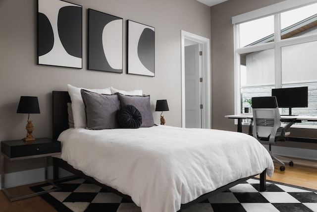 bedroom featuring hardwood / wood-style flooring