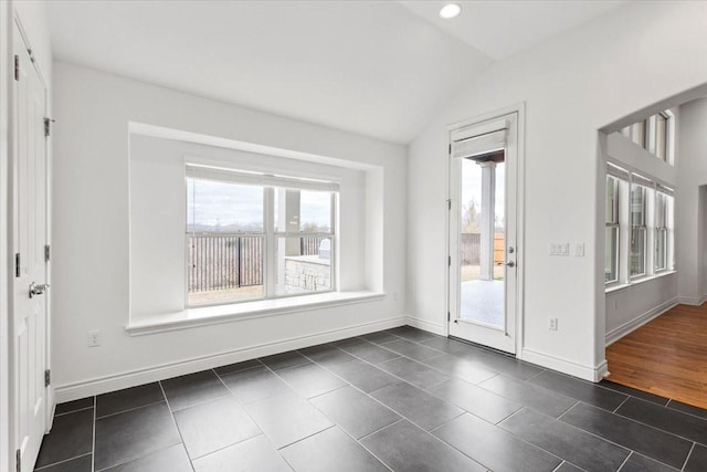 interior space featuring vaulted ceiling