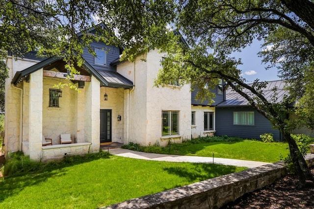 view of front of house with a front yard