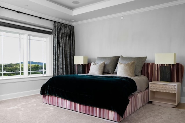 carpeted bedroom featuring crown molding