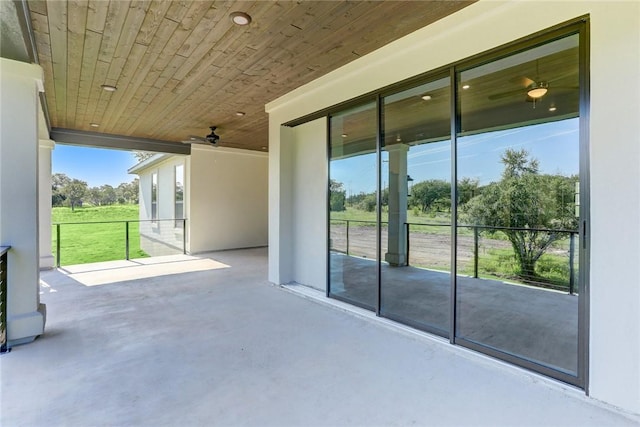 view of patio with ceiling fan