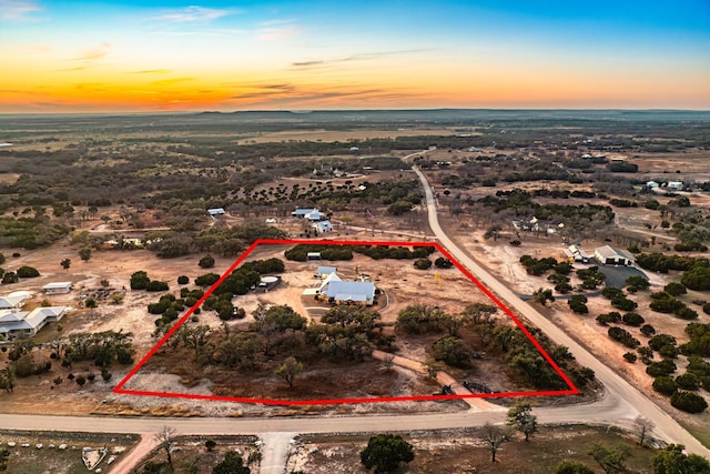 view of aerial view at dusk