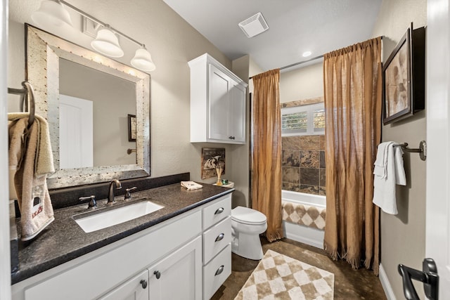 full bathroom featuring toilet, vanity, and shower / bath combo