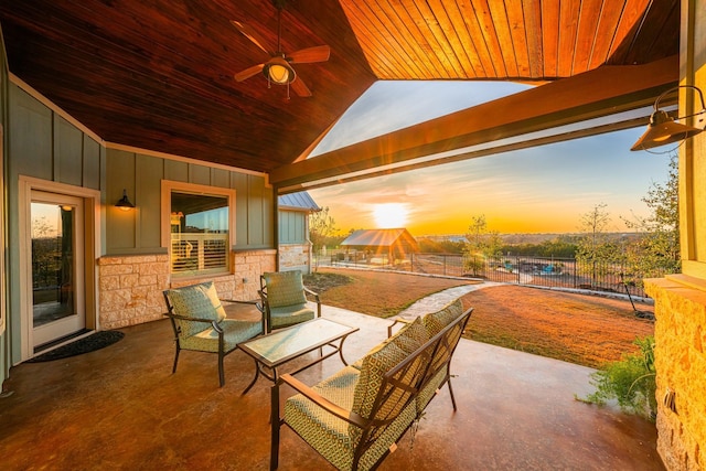 patio terrace at dusk with ceiling fan