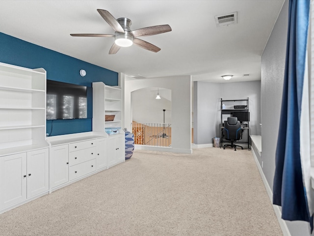 carpeted bedroom featuring ceiling fan