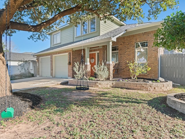 view of front facade featuring a garage and a porch