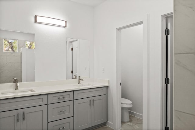 20714 Northland Dr, Lago Vista, TX 78645 - bathroom featuring marble finish flooring and double vanity