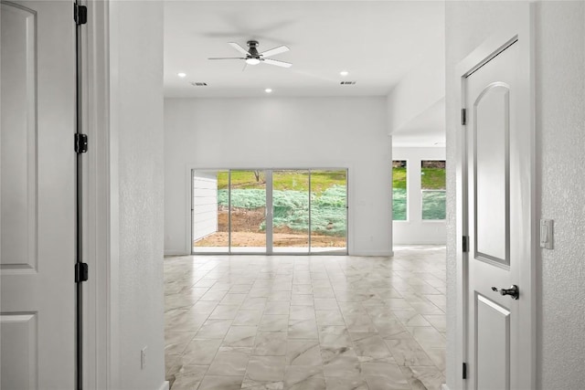20714 Northland Dr, Lago Vista, TX 78645 - empty room with a ceiling fan and recessed lighting