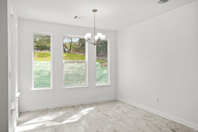 20714 Northland Dr, Lago Vista, TX 78645 - unfurnished room featuring a chandelier and light marble finish flooring