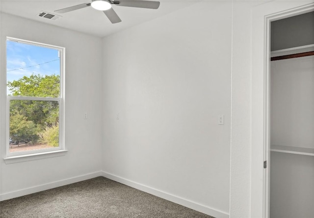 20714 Northland Dr, Lago Vista, TX 78645 - unfurnished bedroom featuring carpet floors, a ceiling fan, and a closet