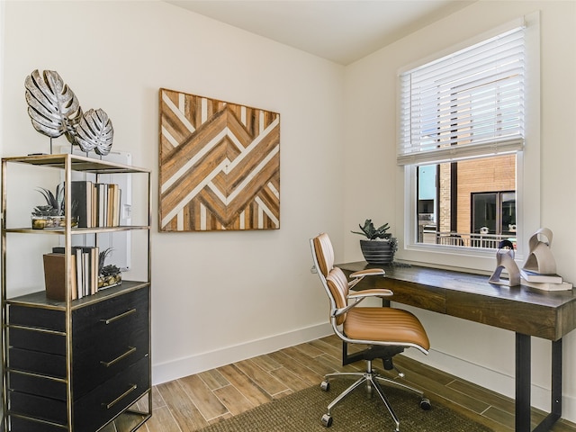 office area with hardwood / wood-style floors