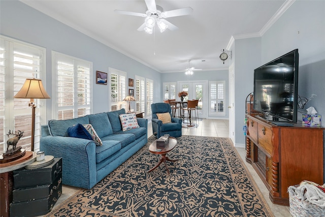 living room with ceiling fan, french doors, ornamental molding, and light tile patterned floors